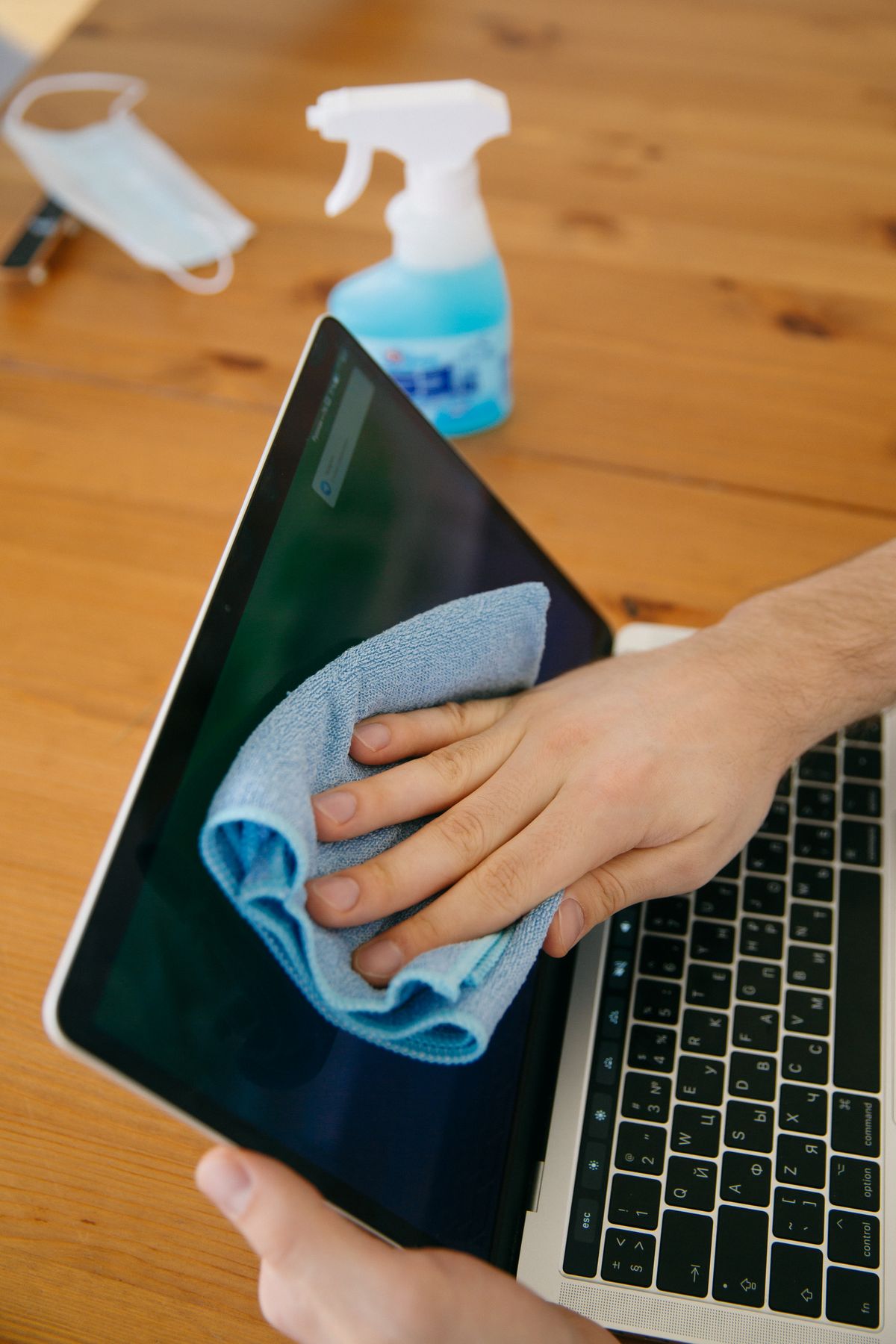 Office laptop and desk cleaning